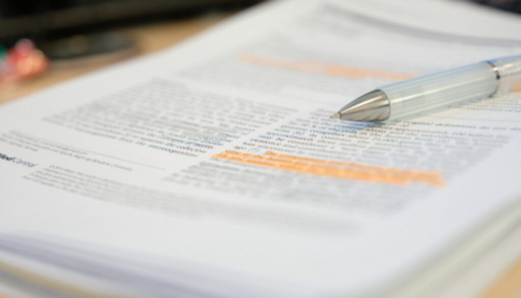 Pencil,Placed,On,Scientific,Journal,Paper,With,Highlight,Color