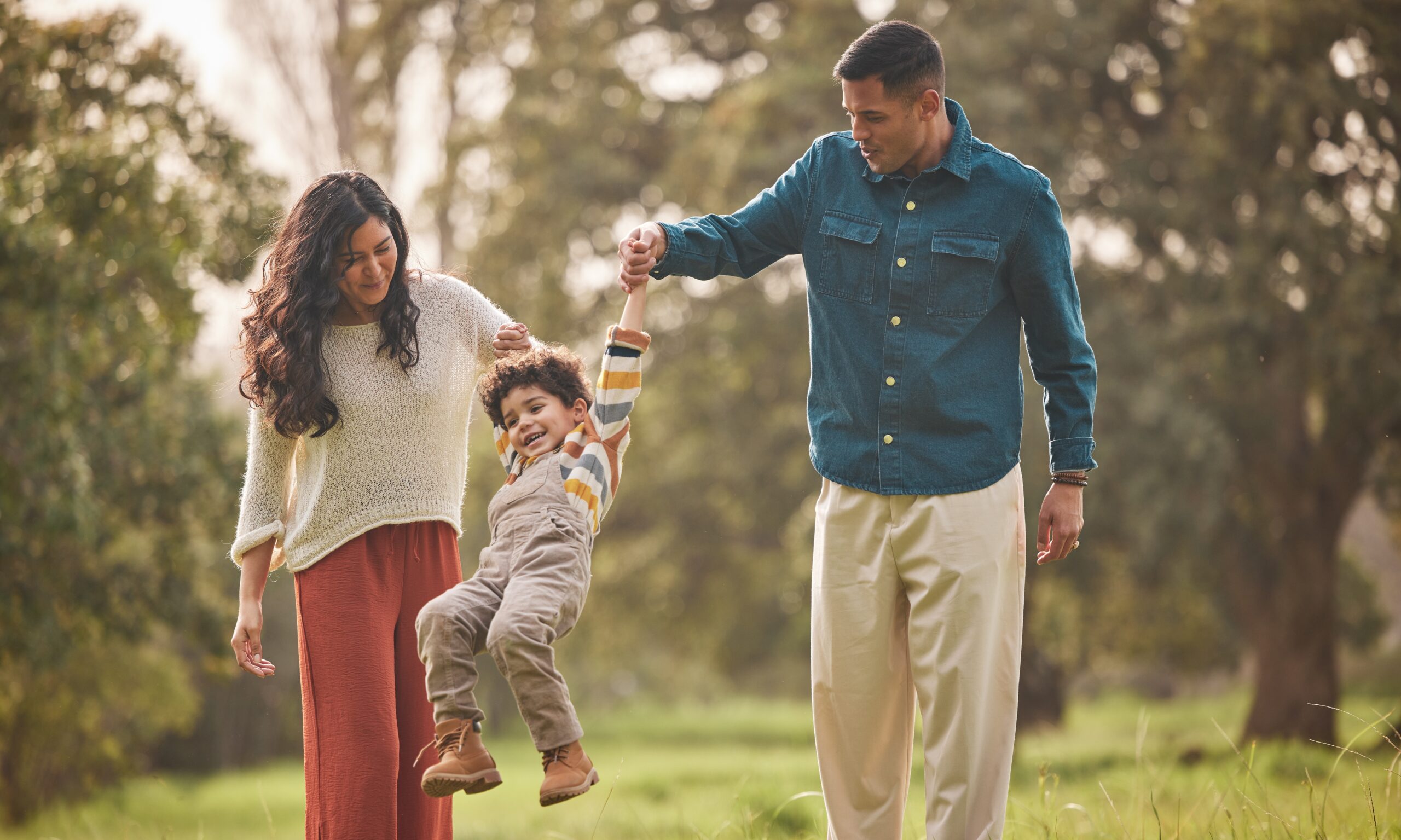 Holding,Hands,,Park,And,Parents,Play,With,Kid,In,Nature